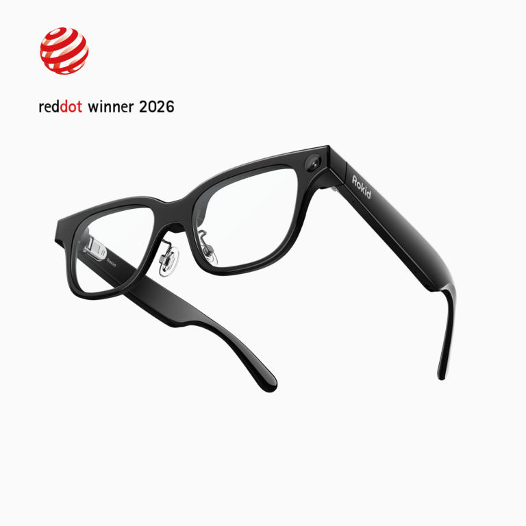Black Rokid smart glasses showing the camera, thick electronic temples and transparent display lenses.