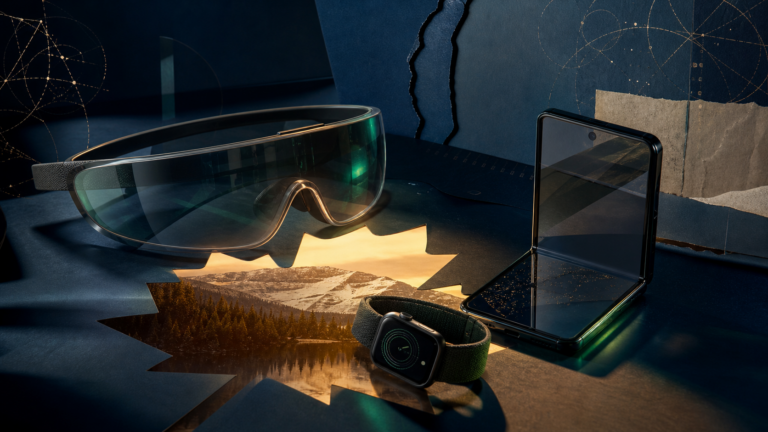 An editorial still life of a spatial visor, folding phone and smartwatch around a maple-leaf-shaped landscape.